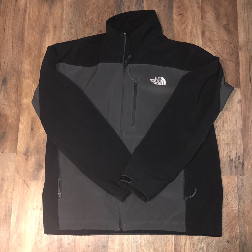 Black and grey north face jacket